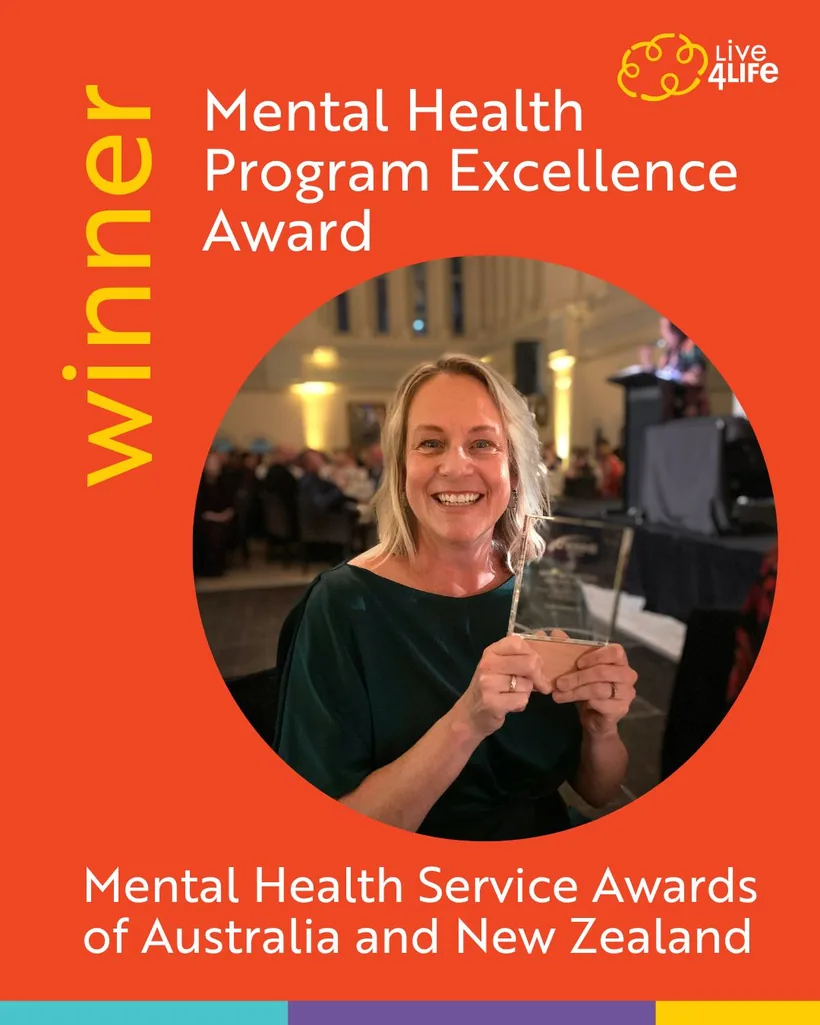 Live4Life winner graphic: Mental Health Program Excellence Award, with a person smiling and holding a glass trophy